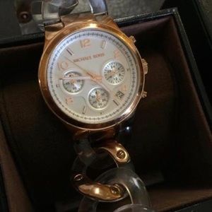 Gold woman's Michael kors watch